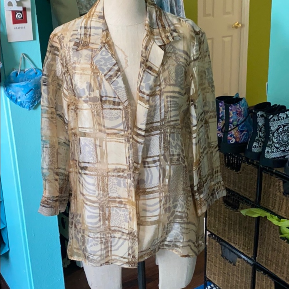 Beautiful buttonless blouse. It was worn once